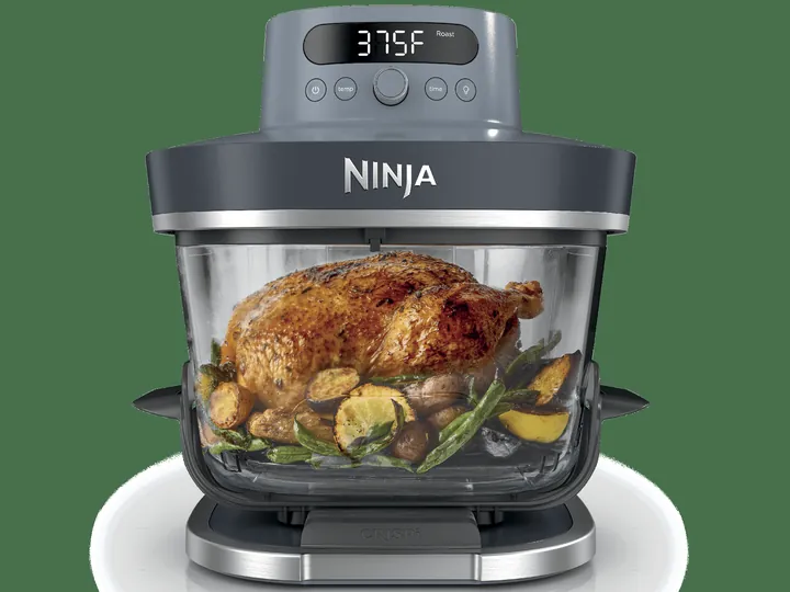 Ninja Crispi Pro Cyberspace glass air fryer with a whole chicken you can see through the glass